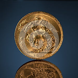 Old golden sovereign coin photo