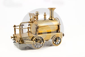 Old golden steam locomotive with bumper