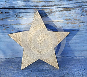 Old golden wooden christmas star for decoration.