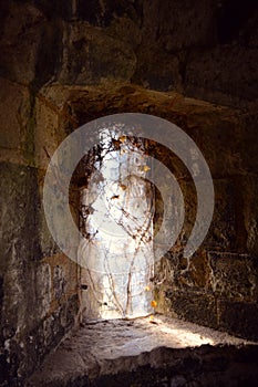 Old gothic haunted window of medieval castle, Carisbrooke Castle, Newport, the Isle of Wight, England