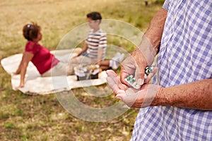 Old Grandfather With Family Taking Medicine Pill For Heart