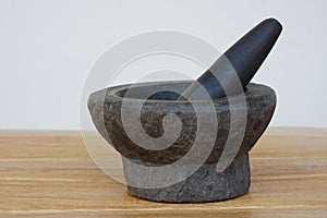 Old granite stone mortar and pestle.