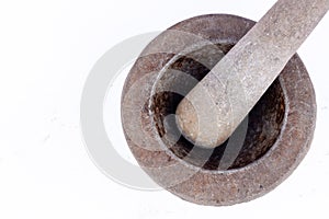 Old granite stone mortar and pestle are Thai cooking tool on white background food isolated ( top view )