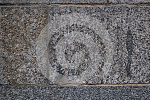 Old granite stone wall. ancient wall. masonry texture, stonework pattern background