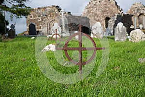 Old grave cross on celtic cemetery in ireland