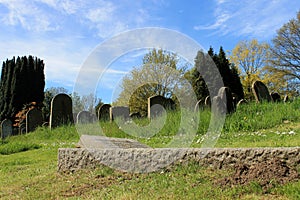 Old graves in cemetery photo