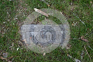 Old gravestone with  Mother on it