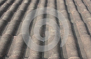 Old gray concrete tile roof photo