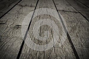 Old gray floorboards with gaps, closeup, background, texture