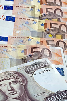 Old greek drachma and euro cash notes