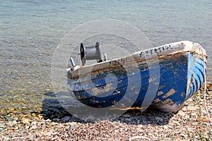 The old Greek fishing boat in the Aegean Sea