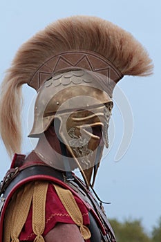 Old Greek soldier with helmet photo