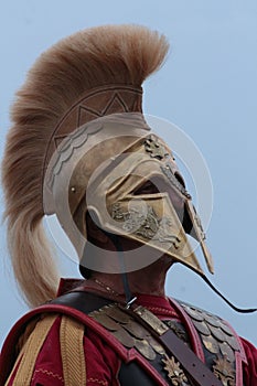 Old Greek soldier with helmet photo