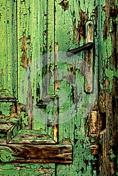 Starý zelený dveře rukojeť 