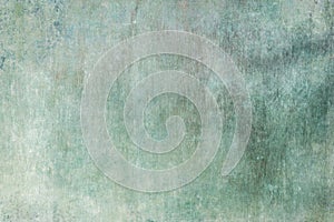 Old green grungy wall background or texture