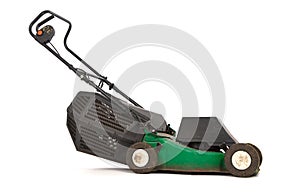 Old green lawn mower