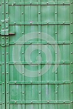 Old green metal gate