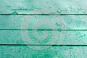 Old green painted natural grunge textured wood background. Aged wood for design