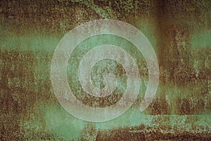 Old green painted rusted metal sheet grunge background