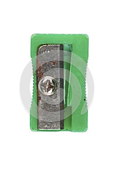 Old green pencil sharpener isolated on white background.Copy space