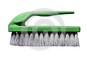 old green plastic household brush isolated on white background