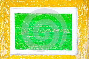 Old green Square wood frame on yellow background. Bright paints, colorful green background. Wooden background painted colors. The