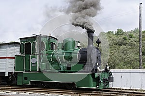 Old green steam train in Holland