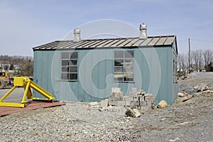 Old green storage shed