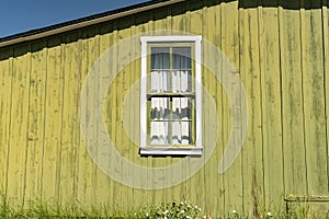Old green window on barn
