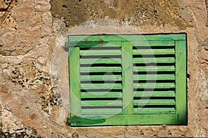 Old green window shutter