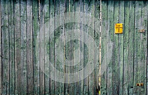 Old green wood fence. plank texture background