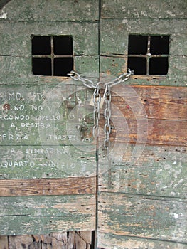 Old Green Wooden Door With Graffiti