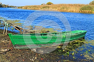 Old green wooden fishing boat