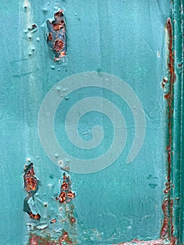 old greenish-blue metal door or wall