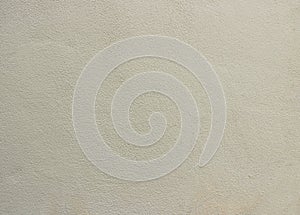The textured of grey cement wall background.