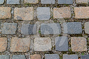 Old grey pavement of cobble stones