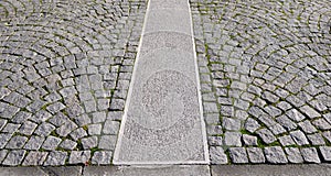 Old grey pavement in a pattern