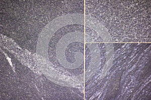 Old grey paving slabs, background or texture