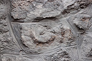 Old grey stone wall background texture close up. Krakow, Poland