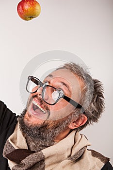Old grumpy man with beard and big nerd glasses