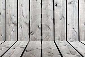 Old grunge beige-brown wood panel pattern with shelf detail, grain surface texture and vertical striped background or backdrop