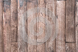 Old grunge brown wood wall paneling texture, wooden background, wood planks