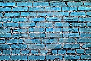 Old grunge cold blue brick wall texture or background