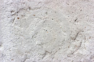 Old grunge dirty cracked vintage light grey concrete and cement mold texture wall or floor background with weathered paint