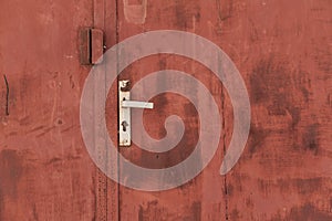 Old grunge and dirty metal closeup of steel door with door handles and lock vintage retro style background and texture in Sofia,