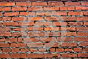 Old grunge red brick wall texture or background