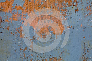 Old grunge rusty iron metal wall blue background