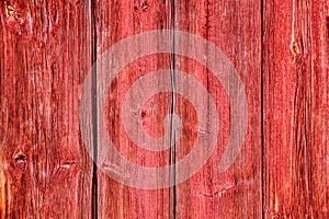 Old grunge and weathered red wooden wall planks texture background