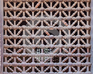 Old grunge weathered wooden fixed latticed window Mashrabiya photo