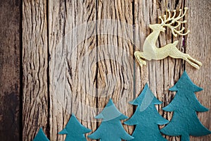 Old grunge wooden board with Christmas border.